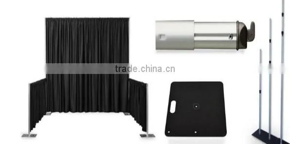 fancy and elegant pipe and drape wedding backdrop