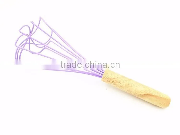 Wooden egg whisk
