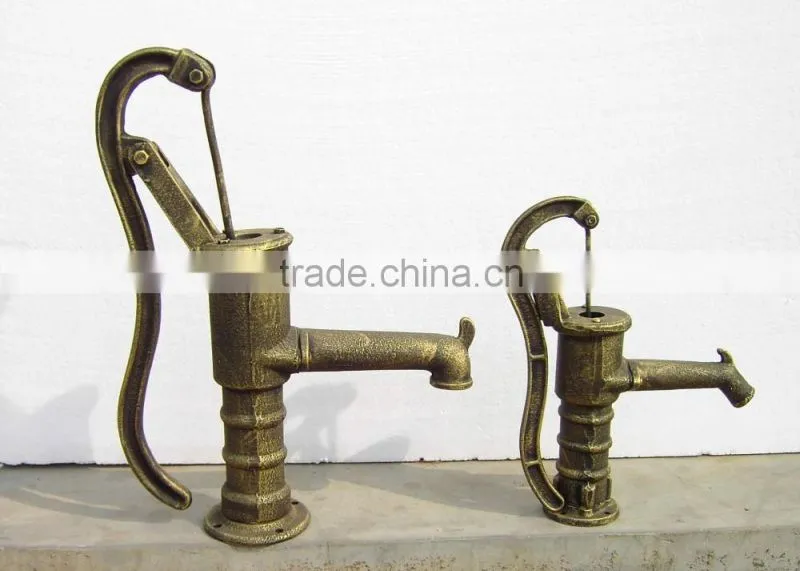 cast iron hand pump garden villiage using