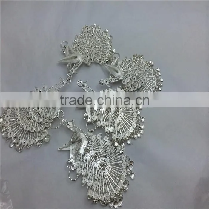 Ethnic minorities The dai nationality silver peacock dress decoration silver plating processing