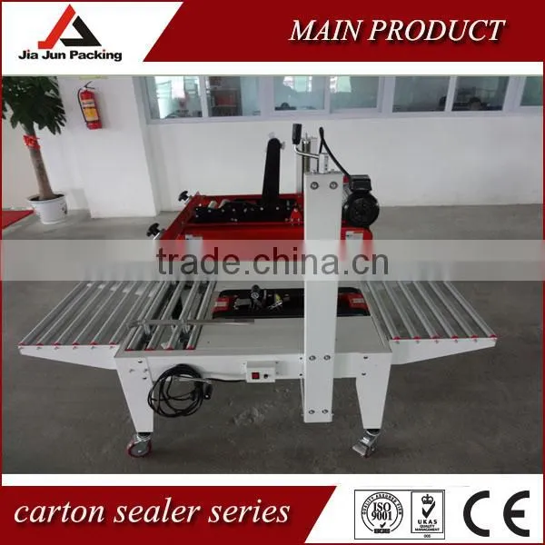 Automatic carton box sealing machine