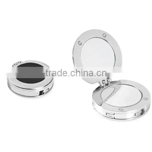 round pocket mirror with comb