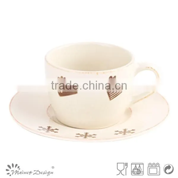 high-volume Christmas coffee cup and saucer