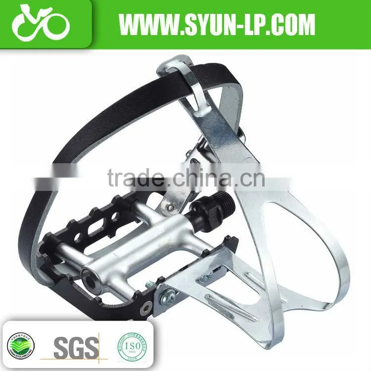 bicycle pedals + steel toe-clips + straps