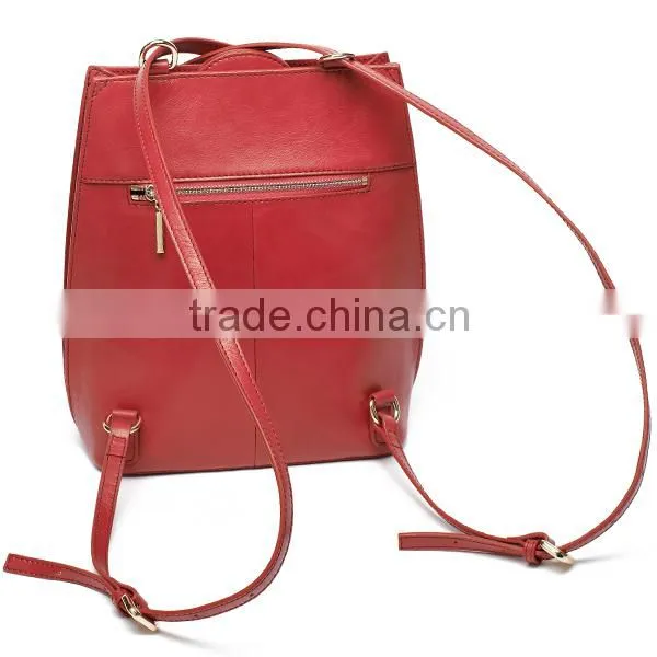Multipurpose leather bag convert to a backpack from a shoulder bag