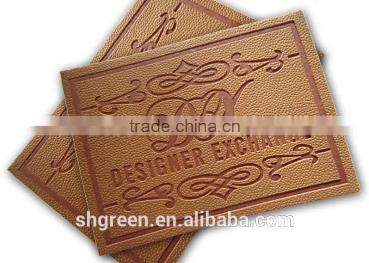 Dark brown irregular false leather label for pants