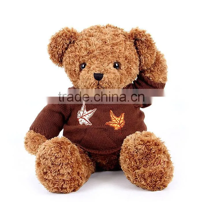 stuffed teddy bear with clothes