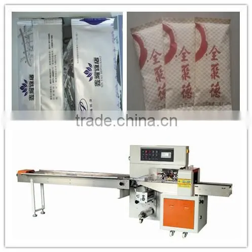 Refreshing towel flow wrapping machine