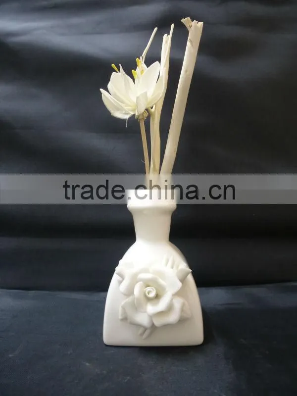 white ceramic oil diffuser with rose