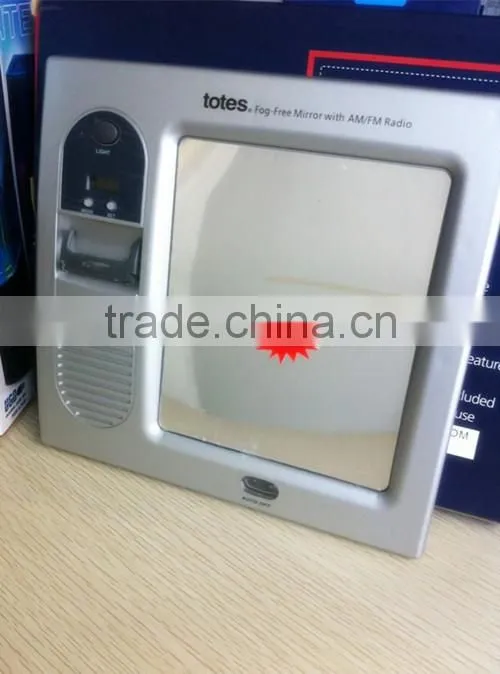 Fog-free mirror with AM/FM radio