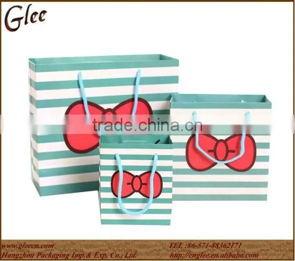 Cheap cartoon paper shopping/gift bag with handles