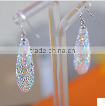Ruby earrings, noble earrings. Simulation of diamond earrings