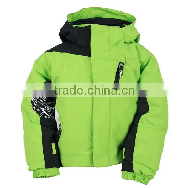 green warm little boys ski jacket in snow sport