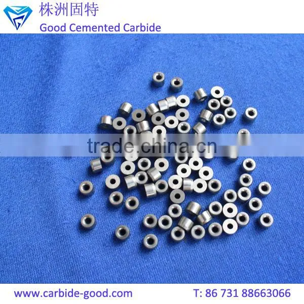Discharge valve seat made from tungsten carbide