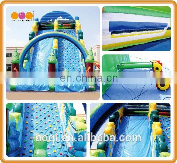 AOQI new style rainbow forest outdoor inflatable high slide with inflatable rock climbing wall for adults