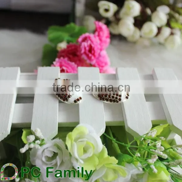 Latest design various custom rugby shape crystal rhinestone buttons