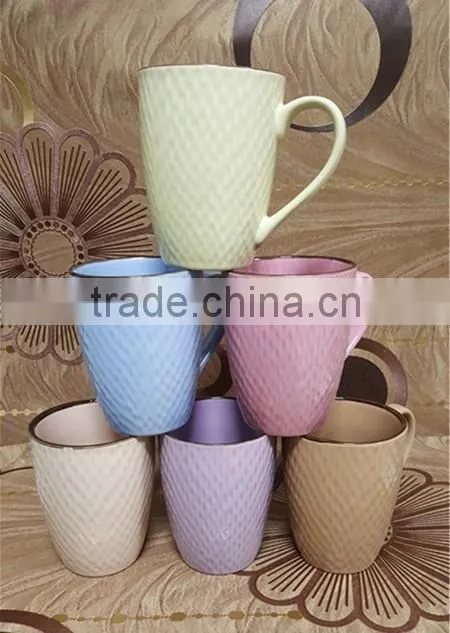 2016 noverty embossed 11 oz solid color cheap stoneware tea mug with rim