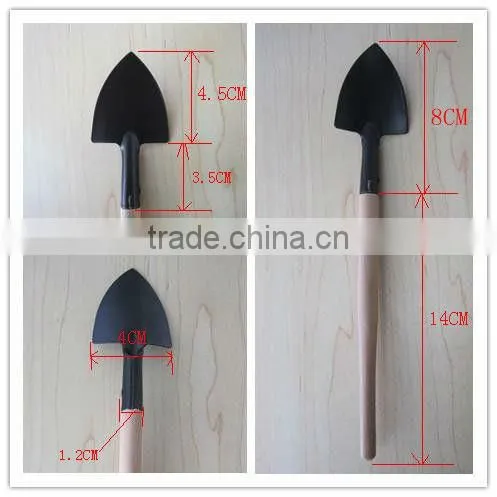 iron sapde with wooden handle garden tool wooden rake wooden shovel wooden spade