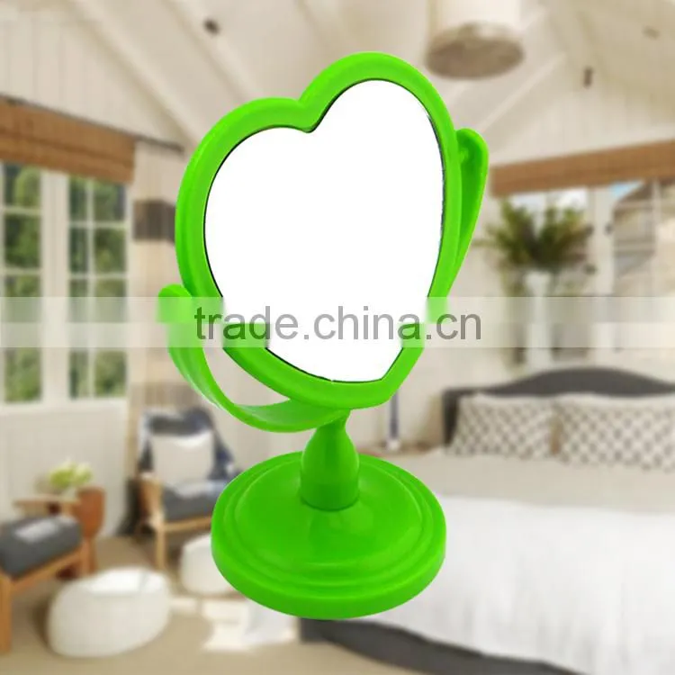 Plastic colourful double heart-shaped magnifying cosmetic/ table mirror