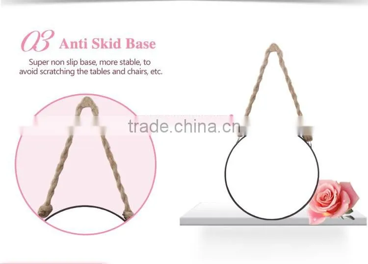 Round metal framed hanging makeup mirror