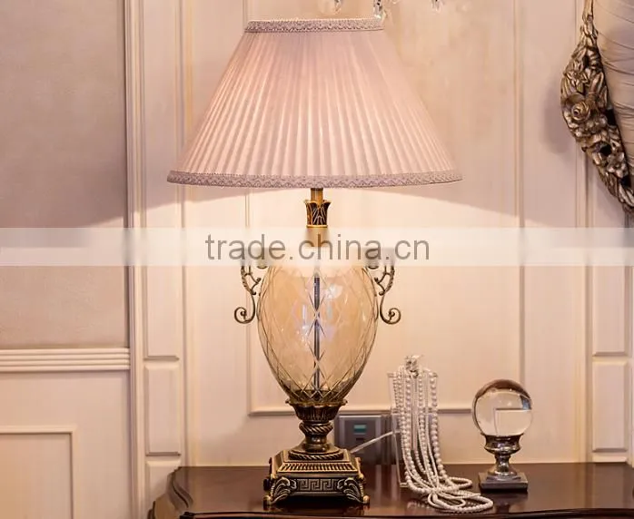 Olivary design clear glass body metal bottom fabric lampshade table lamp
