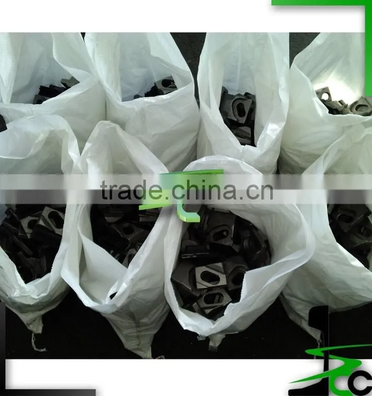 Crane rail clips with vulcanized rubber nose