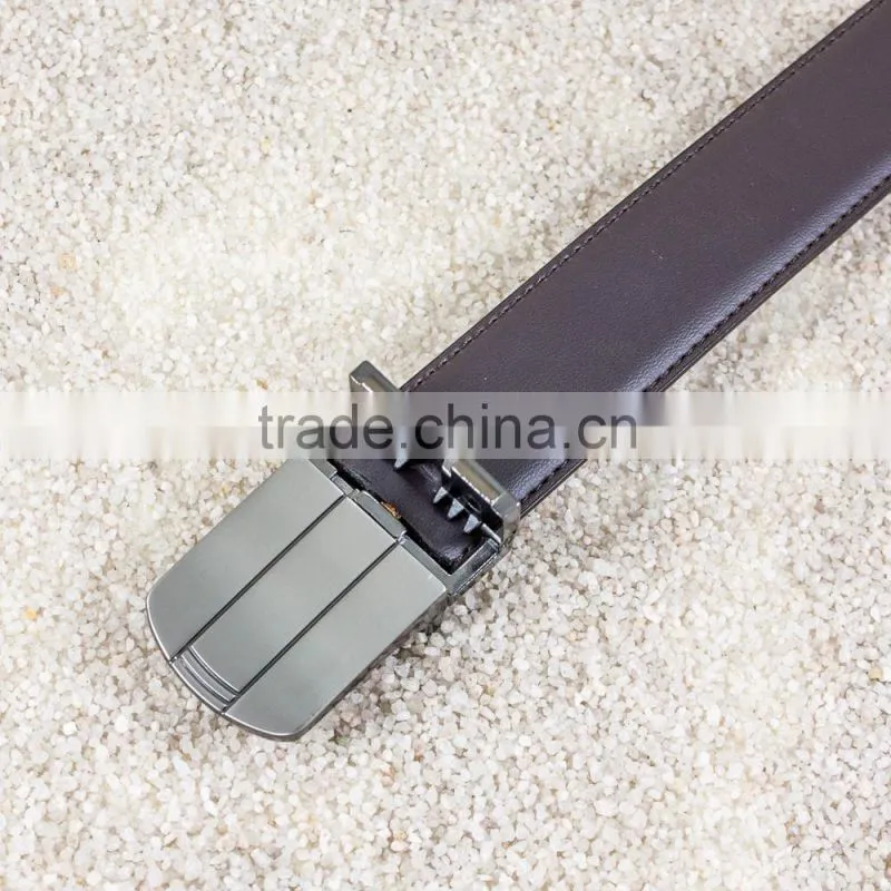 Reversible blank belt buckle with black leather belts