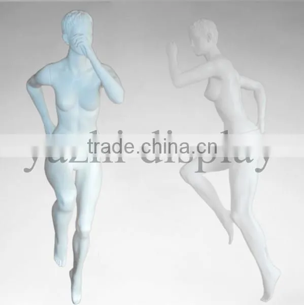 Female sport mannequins with abstract head in matt white