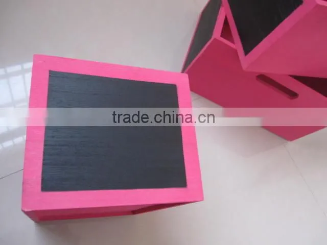 colorful wooden boxes with black board