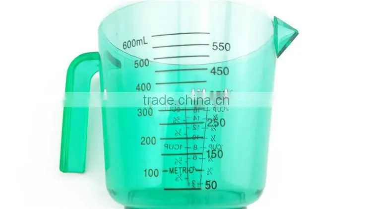 Green plastic food measure jug