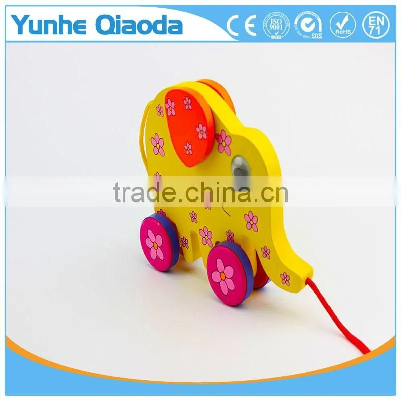 colorful Pull Along elephant Wooden Toy as you pull they make a fun for baby