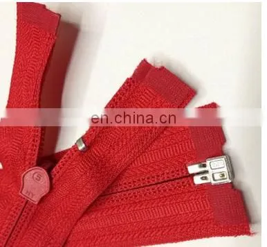 fashionable red nylon zipper design with metal bow puller