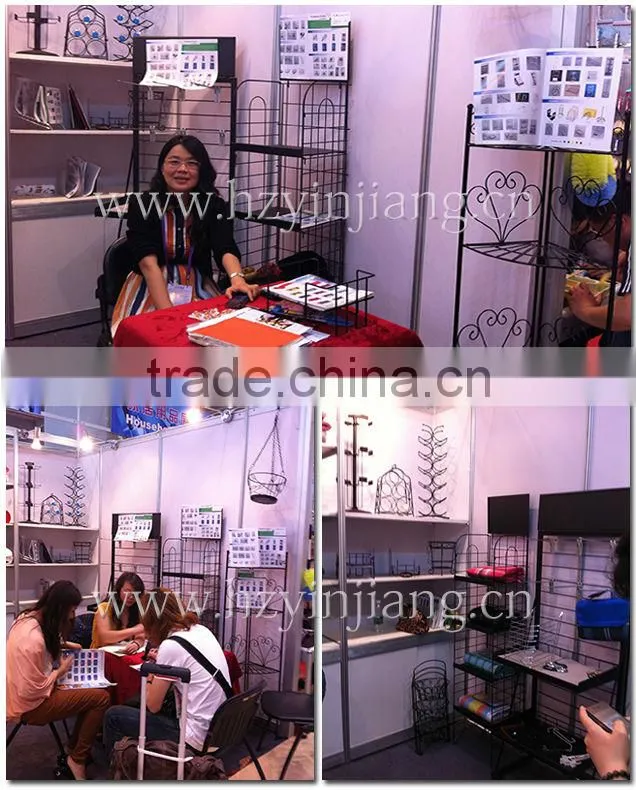 China supplier high quality hot sale stable metal wall-mounted decorative dinosaur wine bottle rack