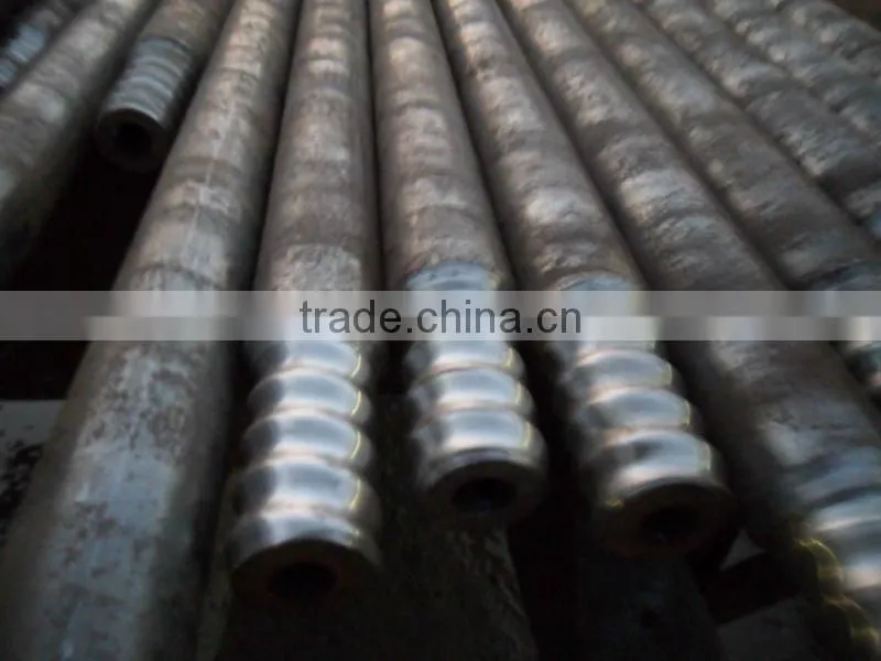 Blast furnace tap hole drilling rod and bits