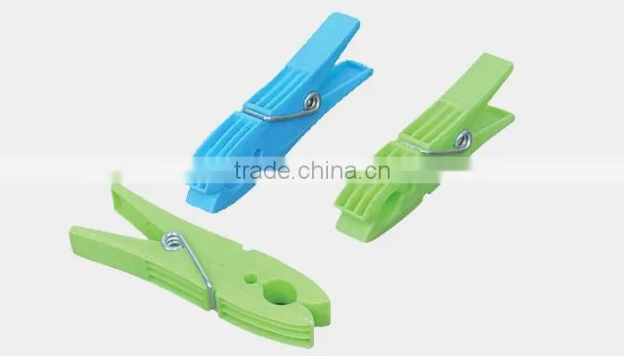 decorated racks of multifunctional colorful plastic clothes peg