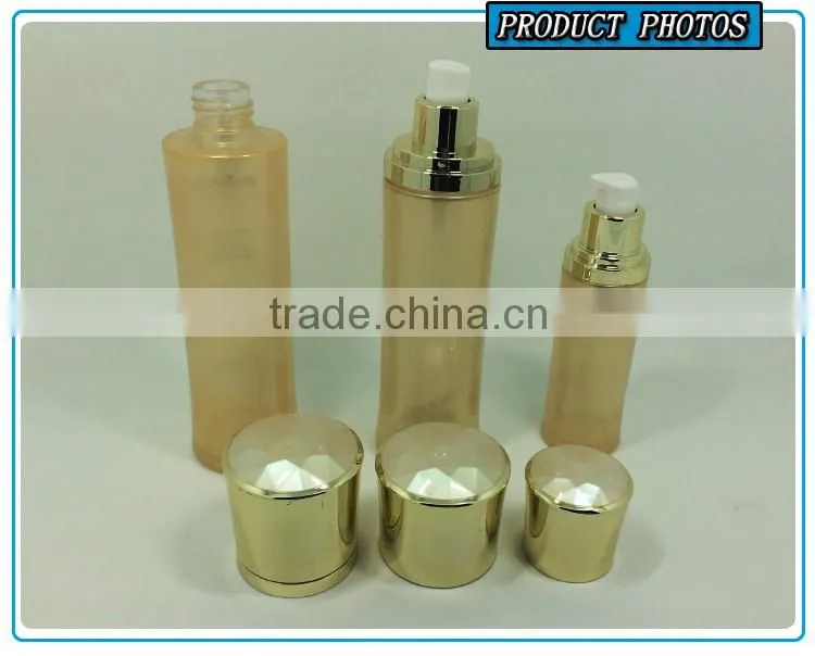 Luxury golden coloured cosmetic glass lotion bottle and cosmetic cream jar