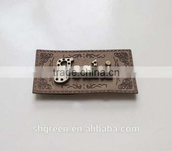 Promotional white real leather label with engraved logo metal plate