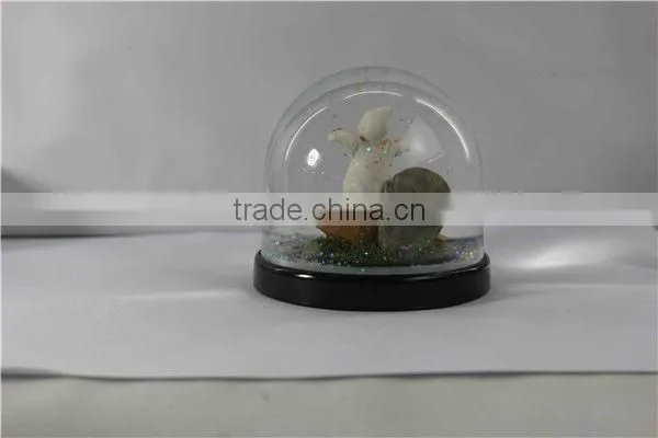 Plastic halloween ghost pumpkin snow globe