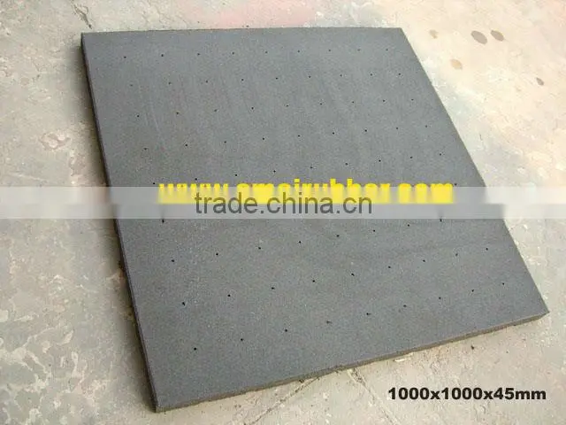 Horse stable mat with upright holes