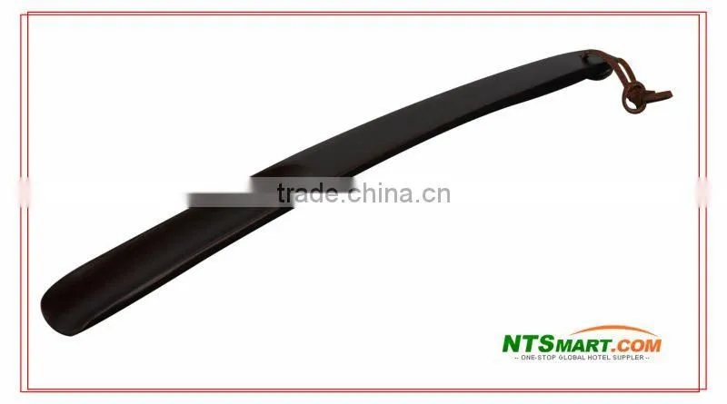 Guestroom long wooden shoe horn