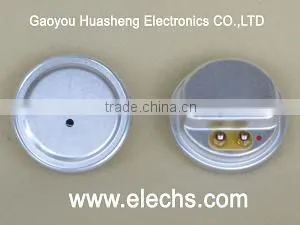 Wide frequency rocking armature transducer