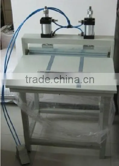 Pneumatil creasing machine for photo album flatten