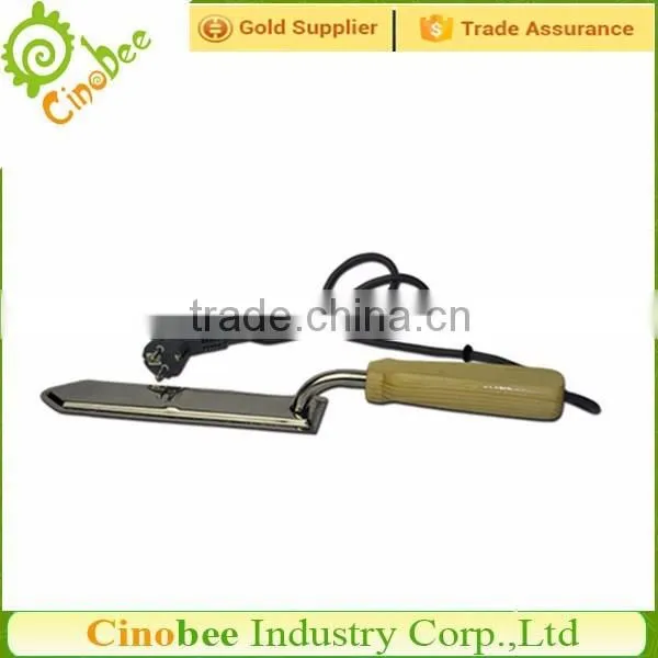 Electric heated uncapping knife