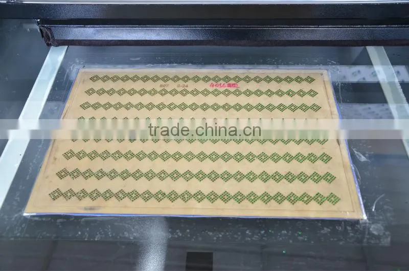 Semi-automatic rhinestone brushing machine for shoes and bags