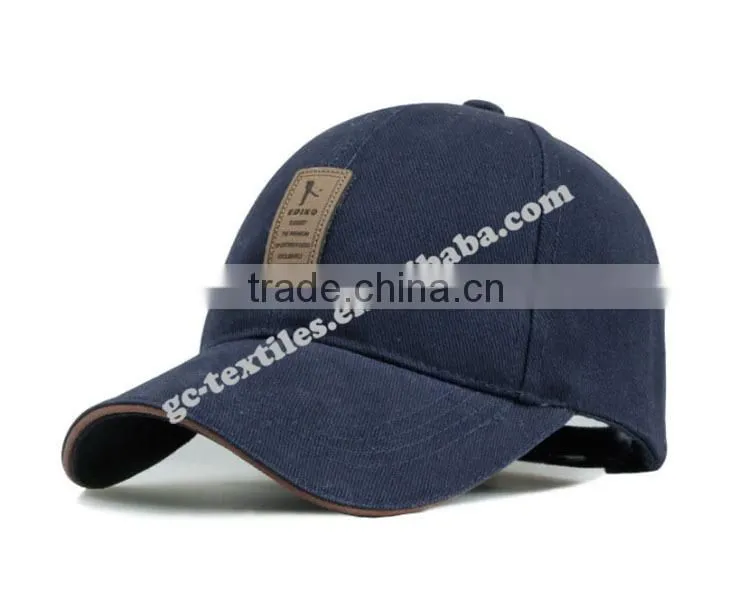 sandwich cotton twill fabric with embossed brown rubber badge logo on front and velcro back sports baseball caps