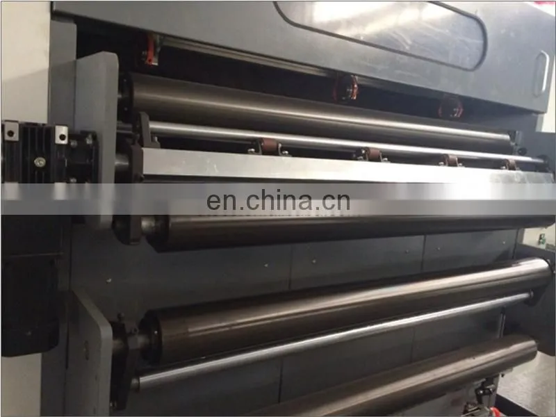 UCM1900A High Speed 4 Roll Automatic Paper cutting slitting Machine with conveyor belt stacker