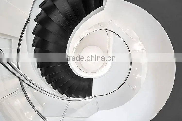 hotel lobby curved stainless steel glass staircase