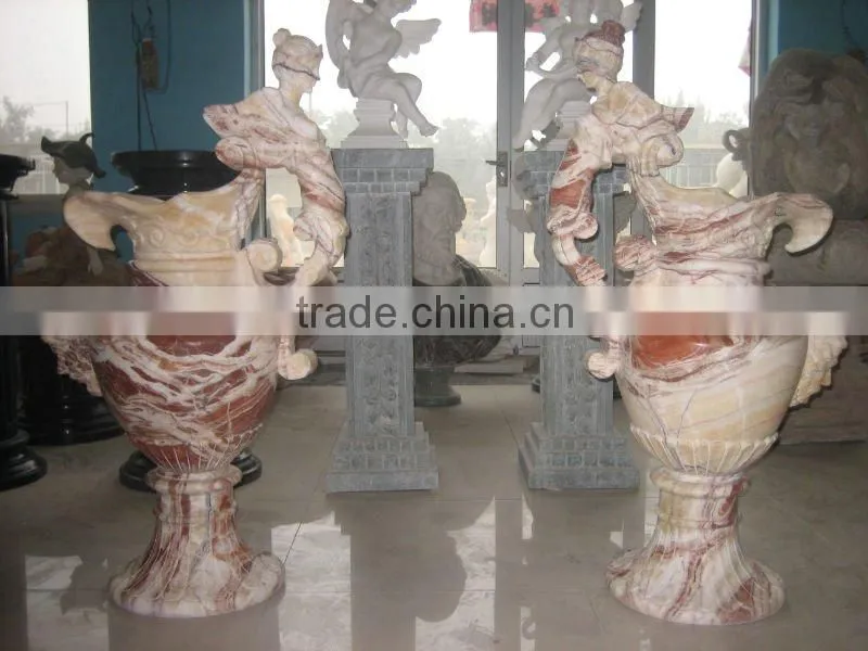 white marble sculpture flowerpot
