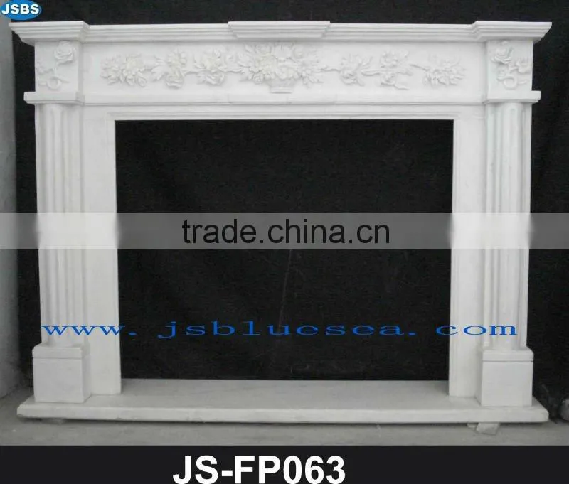 Carved white marble fireplace frame