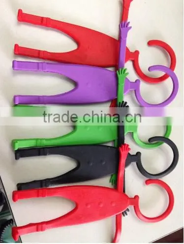Phone Partner = flexible cell phone holder human hanger design